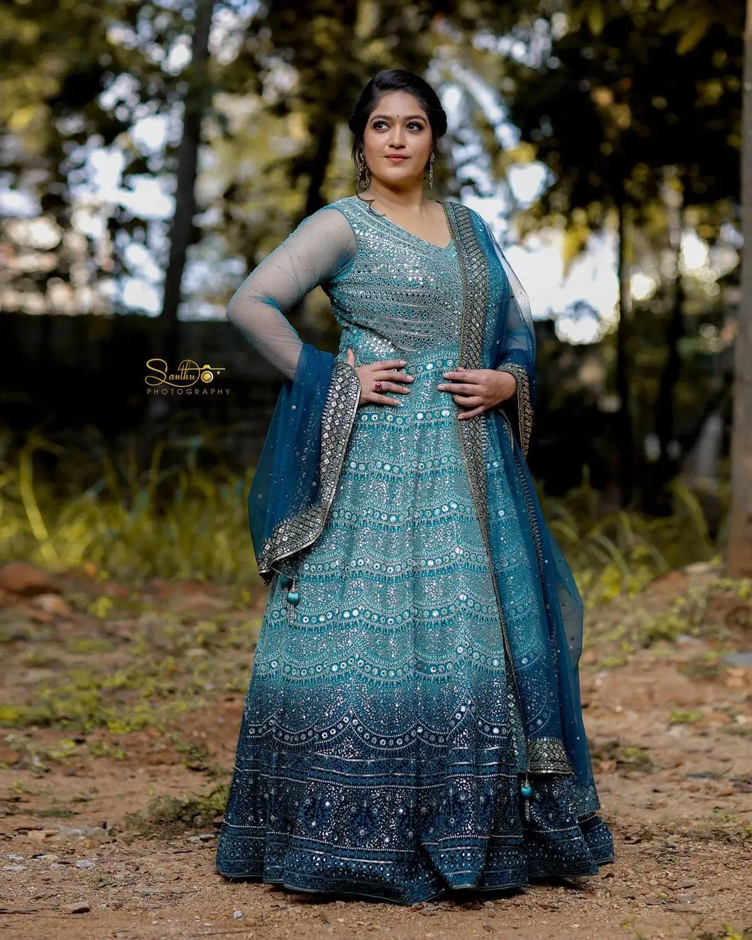 Actress Meghana Raj Stills in Beautiful Blue Designer Gown